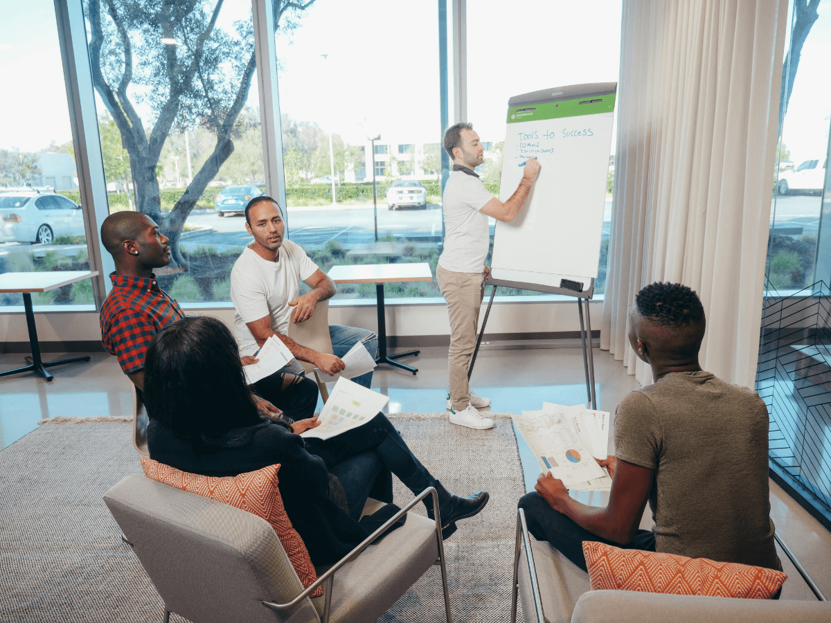 Marketing analysts implementing strategy of digital marketing for startups.